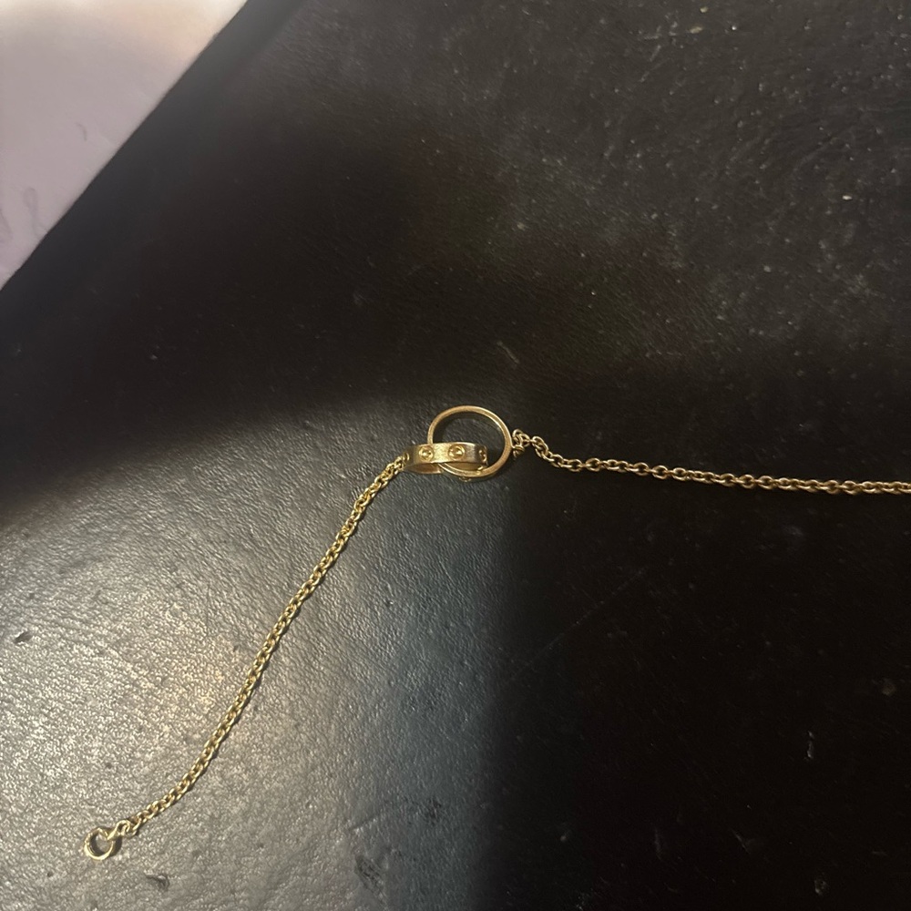 Cartier Gold Interlocking Rings Bracelet with Delicate Chain - Picture 2 of 12